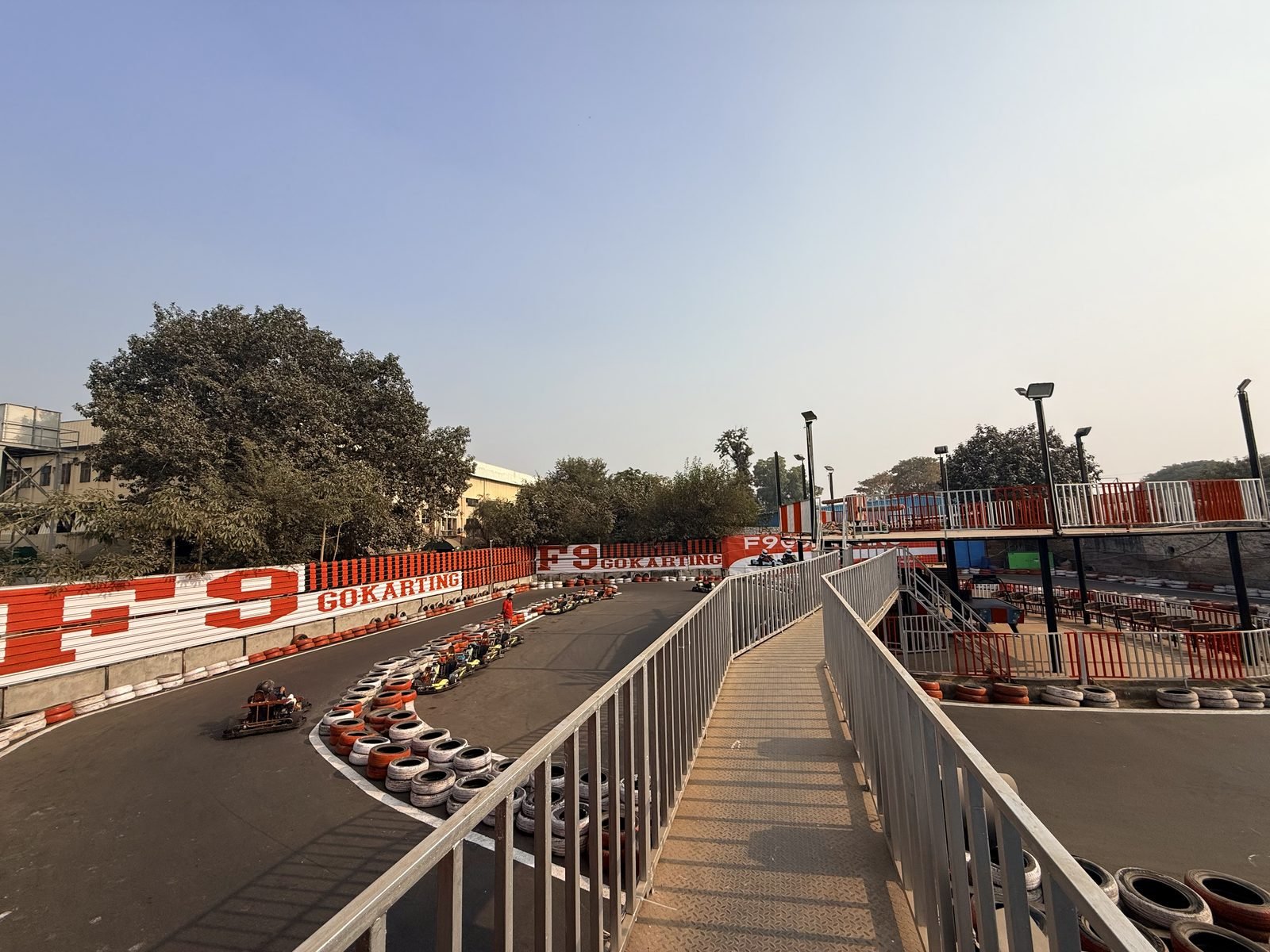 Karts lined up beside the F9 GOKARTING barrier wall on Track 1, Sector 17/18 Gurgaon